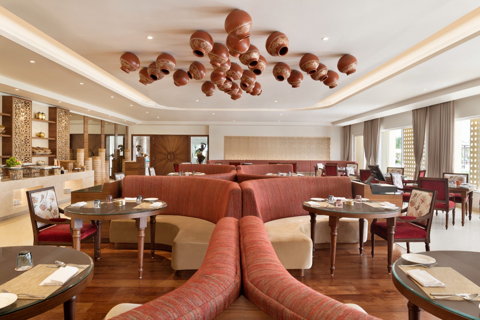 Satvik restaurant seating area at Hawthorn Suites Dwarka
